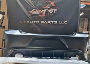 2010 2014 Dodge charger srt rear bumper complete with the diffuser fits all charger models 10/14..